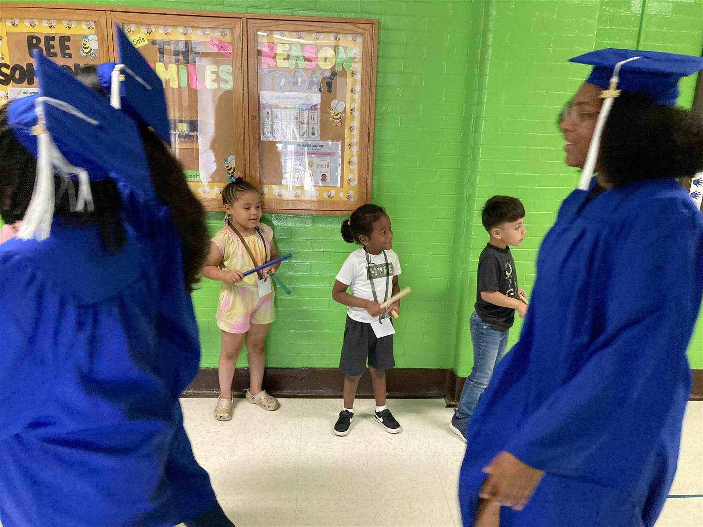 senior-walk-delights-impending-grads-inspires-young-learners